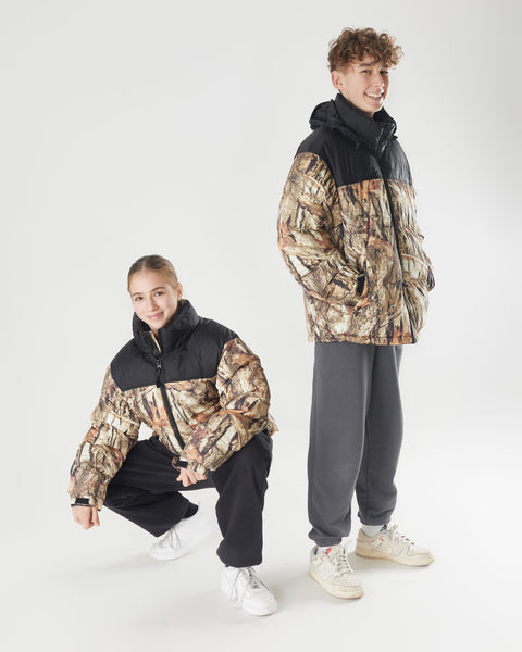 KNDRCK zimska jakna - črna in camo vzorec